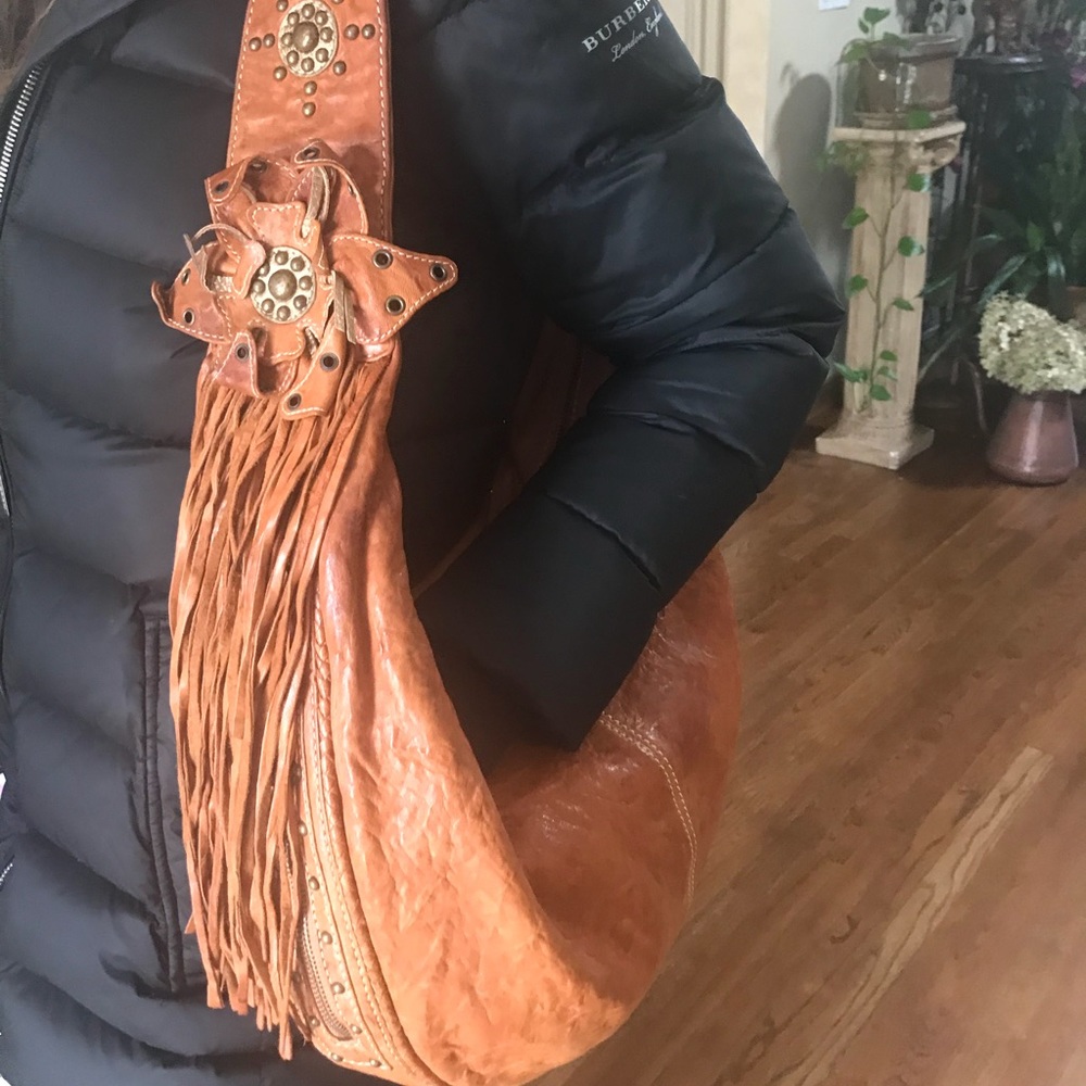 Leather boho fringe bag by Jumar Darry